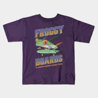 Cute and Funny Froggy Boards with a Red eyed Tree Frog riding a skateboard having a jumpy bumpy good time Kids T-Shirt